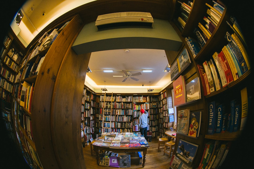 person-inside-library-ro6kcpzvopo